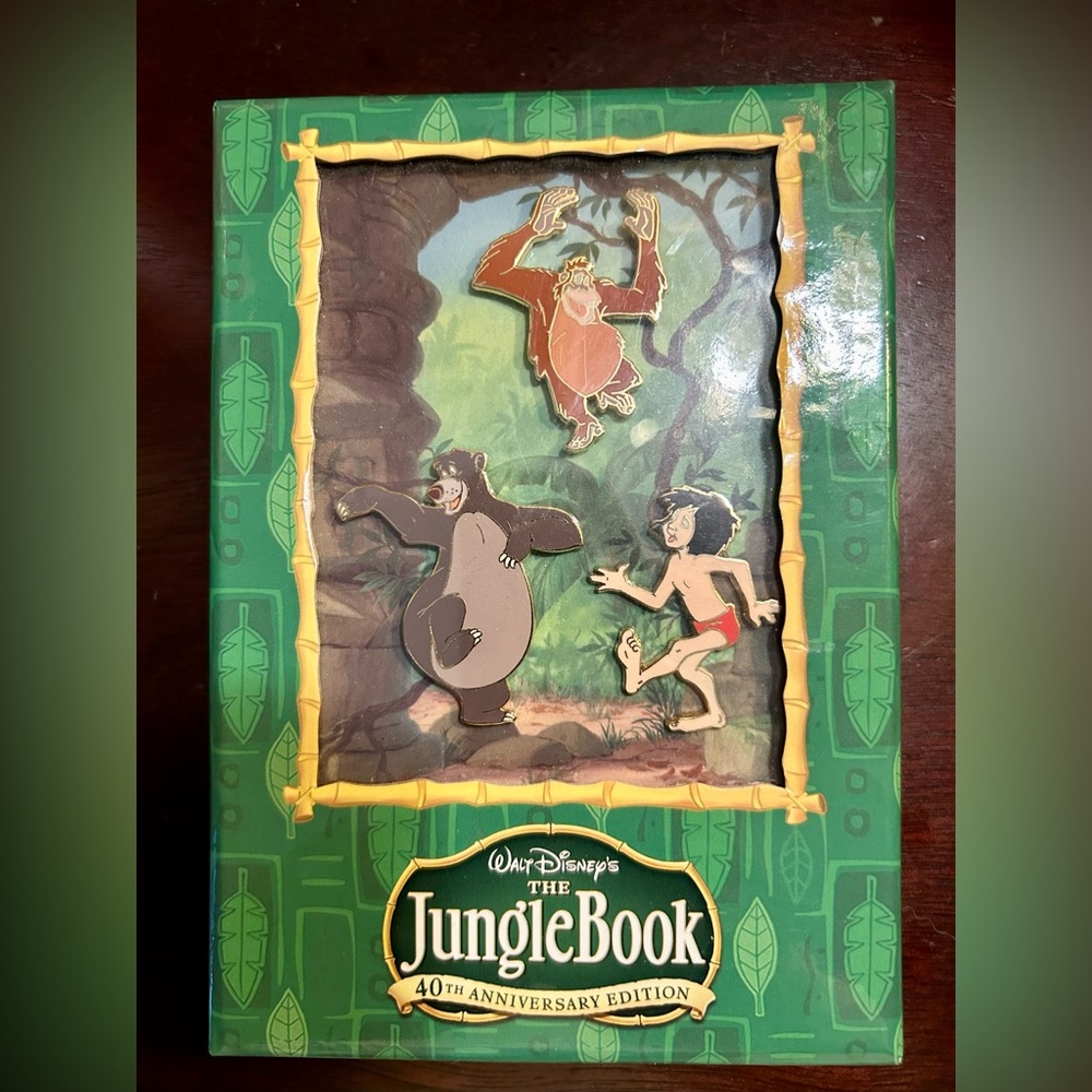 Jungle Book 40th anniversary set of 3 pins new in box. Disney fans!!
